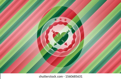 heart with two arrows icon inside christmas badge.