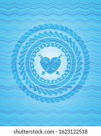 heart with two arrows icon inside light blue water style badge.