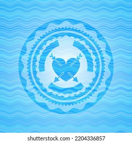 Heart With Two Arrows Icon Inside Water Representation Emblem Background. 