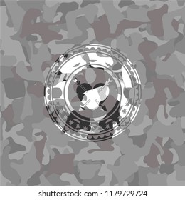 heart with two arrows icon on grey camouflage texture