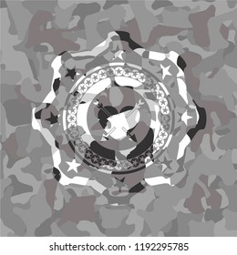 heart with two arrows icon on grey camouflage texture