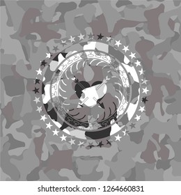 heart with two arrows icon on grey camo texture