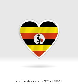 Heart from Uganda flag. Silver button heart and flag template. Easy editing and vector in groups. National flag vector illustration on white background.