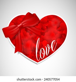 Heart for Valentines day with heart pattern and bow, red.