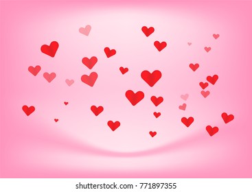 Heart of Valentines falling on pink background