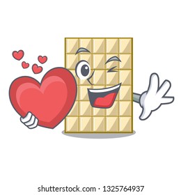With heart white chocolate on mascot wood table