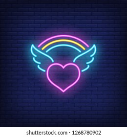 Heart with wings neon sign. Glowing neon heart with wings and rainbow on brick wall background. Vector illustration can be used for topics like romantic, love, relationships