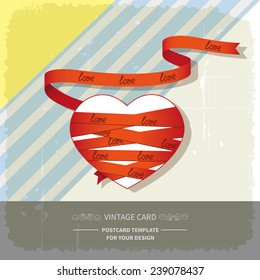 Heart wrapped red ribbon on retro background