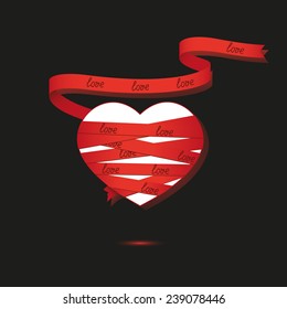 Heart wrapped red ribbon on black background
