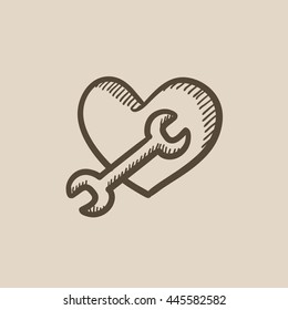 Heart with wrench vector sketch icon isolated on background. Hand drawn Heart with wrench icon. Heart with wrench sketch icon for infographic, website or app.