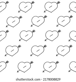 Hearts with an arrow drawn black marker on white paper. Valentine's day concept. Hearts background. Seamless pattern with heart.