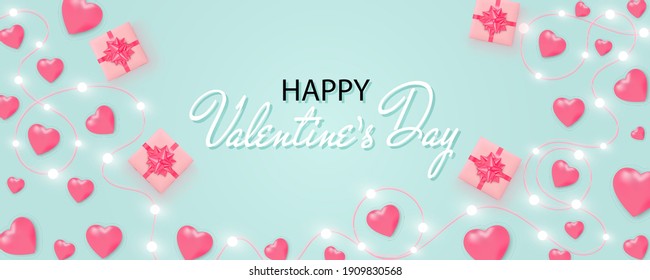 Hearts background. Happy Valentine's Day banner with shining lights garland, light bulbs, hearts, gift box on blue background. Valentine's Day card. Heart pattern.