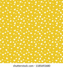 Hearts Confetti Seamless Pattern - White confetti hearts scattered on light orange background
