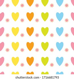 Hearts of different colors on a white background. Seamless vector pattern.


