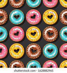 hearts donuts on black background. seamless pattern. Texture for fabric, wrapping, wallpaper. Decorative print.