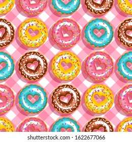 hearts donuts on pink background. seamless pattern. Texture for fabric, wrapping, wallpaper. Decorative print.