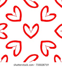 Hearts drawn by hand with rough brush. Romantic seamless pattern. Sketch, grunge, graffiti. Red outlines on white background. Vector illustration.