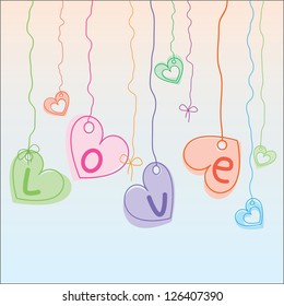 hearts hanging on strings, word "love"