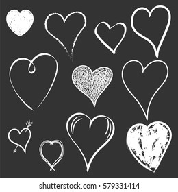 Hearts icon set. Love hand drawn vector illustration on black background.