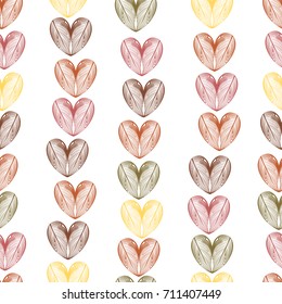 The hearts from the leaves in red tones on a white background