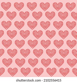 hearts made up of smaller hearts on a red background