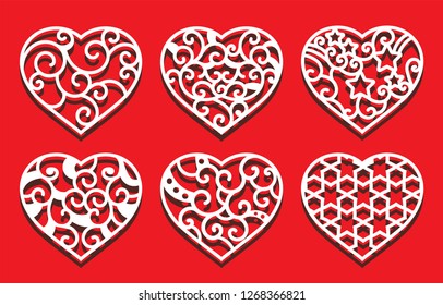 Hearts on the red background for laser cutting. Set of white ornamental hearts
