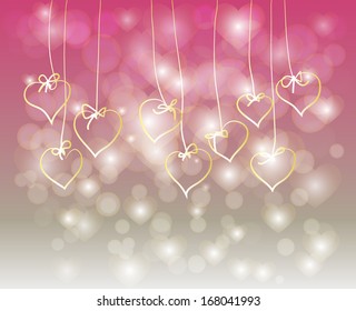 hearts on strings on a pink background