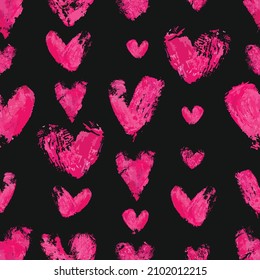 Hearts seamless pattern. Cute repeat texture for Valentine's Day. Pink hearts on a black background