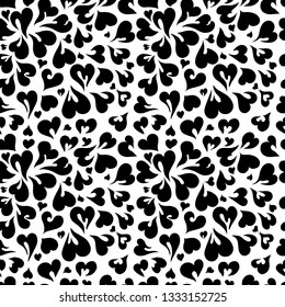 The Hearts seamless pattern. Located in a chaotic direction, vector background. Black and white image