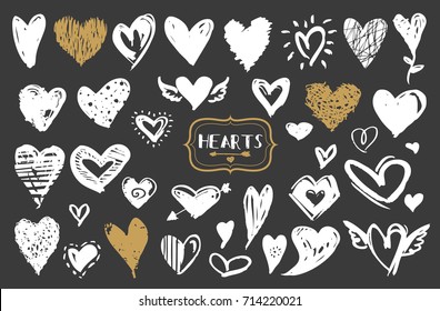 Hearts vector set. Hand drawn doodle icons or design elements for Valentine's day and wedding. 