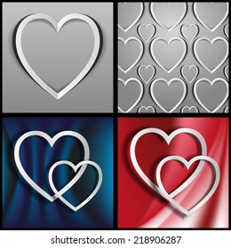 the hearts which are cut out from paper against a dark background