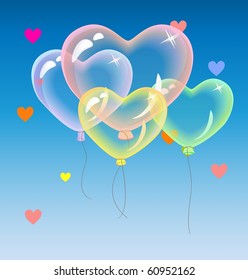 heart-shaped air balloons in the sky