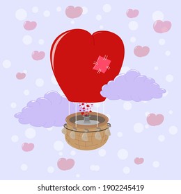 Herzförmiger Ballon zwischen den Wolken