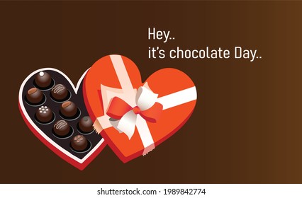 Heart-shaped chocolate wrap with round chocolate filling. Celebration of Chocolate Day with the words Hey, its chocolate day on 7 July 2021
