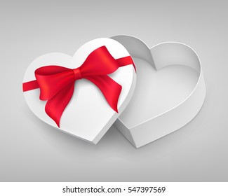 Heart-shaped gift box with red tied knot