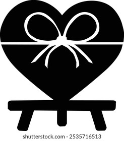 Heart-Shaped Gift Silhouette Vector Art. A charming heart-shaped gift box tied with a bow, perched elegantly on a stand. Perfect for romantic themes, Valentine’s Day, weddings, and celebrations.