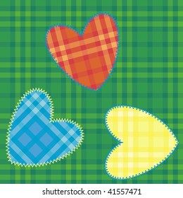 heart-shaped patch sewn onto fabric plaid