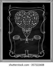 heart-shaped tree with papirus and frame on a blackboard