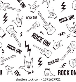 Heavy metal and grunge  seamless pattern with hands and electric guitars. Repetitive rock and roll background with underground objects related to music.