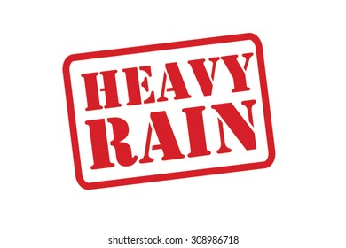 HEAVY RAIN red Rubber Stamp over a white background.