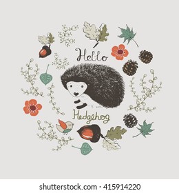 hedgehog/hand drawn vector illustration of cute hedgehog/ frame of leafs/lettering "hello hedgehog"/can be used for kid's or baby's shirt design/fashion print design/fashion graphic/t-shirt/kids wear