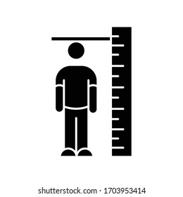 Height measurement black glyph icon. Human body size determination. Tailoring parameters, body growth silhouette symbol on white space. Person standing near huge ruler vector isolated illustration