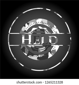 Held on grey camouflage texture