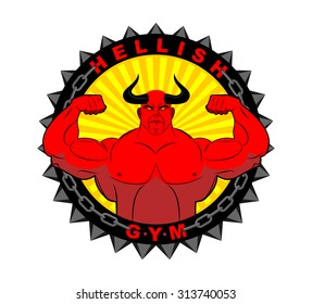 Hellish gym. Emblem for the fitness room. Logo mighty Devil bodybuilder. Red Satan with huge muscles. Sport Demon Athlete shows pose a double biceps. spikes and chains.