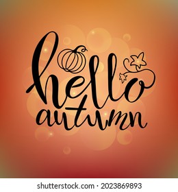 Hello Autumn banner  with hand drawn lettering, leaves and pumpkin on the blurred colorful background. Vector illustration for poster, wrapping paper, print and seasonal greeting card.