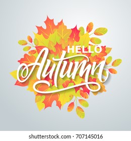 Hello Autumn. Bright abstract background with leaves. Modern handmade vector lettering.