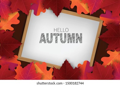 Hello autumn design concept. Typography text on whiteboard in wooden frame and maple leaves around it. Vector illustration.