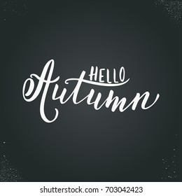 Hello Autumn, hand drawn vector lettering. Brush calligraphy greeting card for fall season.
