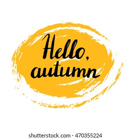 Hello, autumn. Hand painted brush lettering. Seasonal handwritten quote, phrase with paint splash. Modern calligraphy for posters, invitations, greeting cards, prints, badges.