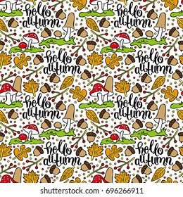 Hello, Autumn. Mushrooms, autumn leaves, acorns, berries. Seamless vector pattern (background).